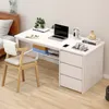 A white desk with a laptop, headphones, and books, next to a bed. Produktbild-Vorschau
