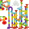 A colorful marble run toy set with many pieces and clear marbles. Podgląd zdjęcia produktu