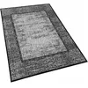 A gray rug with a patterned border is shown from a diagonal angle on a white background. Náhled obrázku produktu