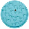 A top-down view of a blue dog puzzle feeder with a dark center. Produktbild-Vorschau