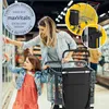 A mother and daughter in a supermarket aisle, with a shopping trolley. Produktbild-Vorschau