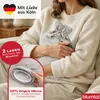 A person holding a gray fluffy hot water bottle. Anteprima dell’immagine prodotto