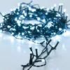 A close-up shot of a string of white LED lights coiled on a white surface. Podgląd zdjęcia produktu