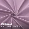 A close-up swirl of pink fabric with text overlay. Produktbild-Vorschau