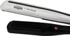 Close-up of a white and black hair straightener. Anteprima dell’immagine prodotto