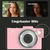 A pink digital camera is shown with two inset images of a woman, one labeled 'Einschalten' (Turn on) and the other 'Ausschalten' (Turn off). Text above the camera reads 'Eingebauter Blitz' (Built-in flash). Produktbild-Vorschau