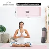 A woman is meditating on a yoga mat, with a diagram of the mat's dimensions and product branding in the background. Produktbild-Vorschau