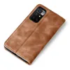 A brown leather flip case for a smartphone is shown on a white background. Produktbild-Vorschau