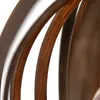 Close-up view of curved wooden elements, possibly part of a lamp or decorative item. Náhled obrázku produktu