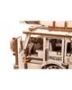 A close-up view of a wooden fire truck model, showing the interior details and the side of the vehicle. Náhľad obrázku produktu