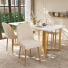 A dining room scene with a marble-topped dining table and four beige upholstered chairs. Náhľad obrázku produktu