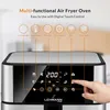 Close-up view of an air fryer oven's control panel, with a hand interacting with the touch screen. Podgląd zdjęcia produktu