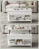 A white lift-top coffee table is shown in two different configurations, next to a sofa. Náhled obrázku produktu