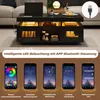 A modern black coffee table with integrated LED lighting, shown in a living room setting with a laptop and decorative items. Below the table, there are five smartphone screens displaying different app features for controlling the LED lights. Náhled obrázku produktu