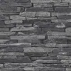 A close-up view of a stone wall texture. Náhľad obrázku produktu