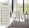 A chair in a modern interior setting with a window view. Produktbild-Vorschau