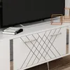 A close-up shot of a white TV stand with geometric black line patterns and silver handles, featuring a television on top and decorative gold wire sculptures behind it. Anteprima dell’immagine prodotto