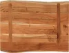A close-up view of a wooden table top with a live edge and two wooden supports. Náhled obrázku produktu