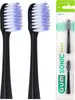 Two black toothbrush heads with purple and white bristles are shown next to a package of GUM Sonic Daily toothbrush heads. Náhled obrázku produktu