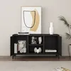 A black metal cabinet with doors and shelves, decorated with various items, in a room setting. Voir les images du produit