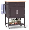 A kitchen cart with a wooden top, a drawer, a cabinet with two doors, and a lower shelf filled with jars. Voir les images du produit