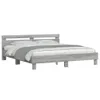 A bed frame with a headboard and mattress, shown against a white background. Produktbild-Vorschau