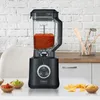 A black CASO Power Blender B 2000 filled with salsa, placed on a white countertop with bowls of dips and tortilla chips. Produktbild-Vorschau