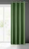 A green curtain hanging in front of a window. Anteprima dell’immagine prodotto