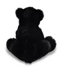 A black teddy bear is shown from the back, sitting on a white background. Produktbild-Vorschau