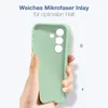 A hand holding a light green phone case against a white and light gray background. Produktbild-Vorschau