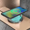 A smartphone in a black case is wirelessly charging on a charging pad, with a charging animation displayed on the phone's screen. Produktbild-Vorschau