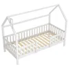 A white wooden house-shaped bed frame with a slatted base, shown from a diagonal angle against a white background. Produktbild-Vorschau