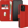 A red leather wallet-style phone case with a phone inside, showing card slots and banknotes. Produktbild-Vorschau