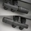 A close-up view of two identical black radiator thermostats, mounted on a grey surface. Produktbild-Vorschau