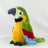 A plush toy parrot sitting on a white surface. Anteprima dell’immagine prodotto