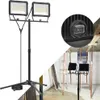 A collage showing a portable LED work light with a tripod stand on a white background and a close-up of the switch, and another image of the work light set up in a construction site. Produktbild-Vorschau
