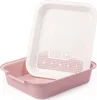 A pink litter box with a white sieve insert, shown against a white background. Produktbild-Vorschau