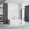 A modern bathroom with a bathtub and a partition. Produktbild-Vorschau