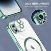 A close-up marketing image of an iPhone case with a clear back and green metallic edges, showing the camera lens protection and MagSafe ring. Produktbild-Vorschau