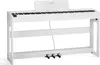 A white digital piano with 88 keys on a white stand with three pedals. Náhľad obrázku produktu