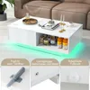 A white coffee table with LED lighting, shown with decorative items and storage. Three close-up insets highlight product features. Voir les images du produit