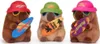 Three plush capybaras wearing hats and sunglasses, each holding a surfboard. Produktbild-Vorschau