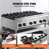 A commercial gas stove with multiple burners on a stainless steel countertop. Voir les images du produit