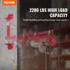 A red electric hoist mounted on a concrete wall, with text overlay highlighting its load capacity. Náhľad obrázku produktu