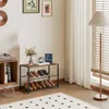 A shoe rack with shoes on it, placed near a window with floor-to-ceiling curtains. Produktbild-Vorschau