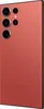 The back of a red Samsung smartphone is shown at an angle against a white background. Náhľad obrázku produktu