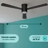 A black ceiling fan is shown mounted on a light gray ceiling in a room with teal walls. Náhled obrázku produktu