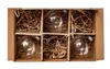 A cardboard box containing six clear glass Christmas ornaments, each nestled in shredded paper. Podgląd zdjęcia produktu