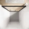 A top-down view of a modern shower enclosure with black framing, set against marble-tiled walls and a herringbone wood floor. Anteprima dell’immagine prodotto