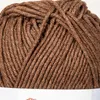 A close-up view of a ball of brown yarn. Podgląd zdjęcia produktu
